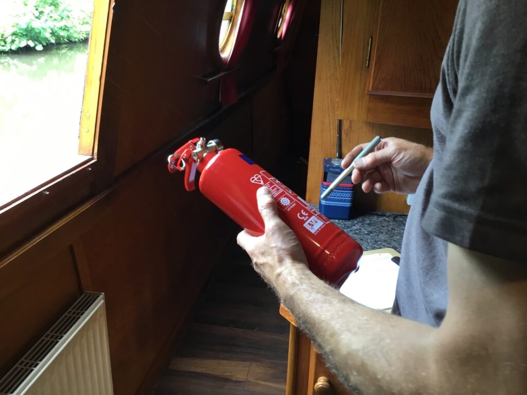Fire extinguisher inspection in process