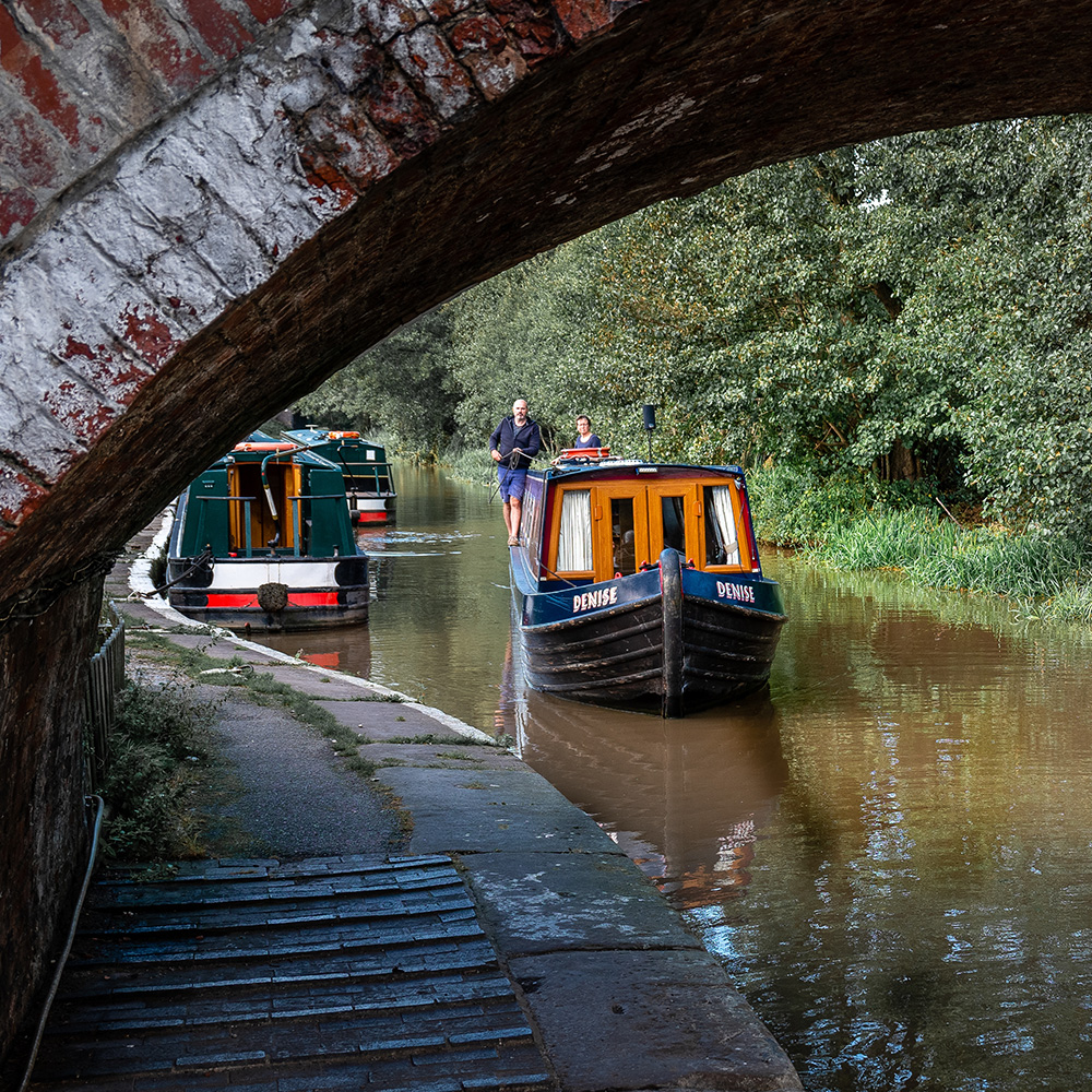 narrowboat passing through a tunnel